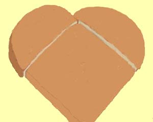 Image: Illustration on how to assemble a heart shaped cake