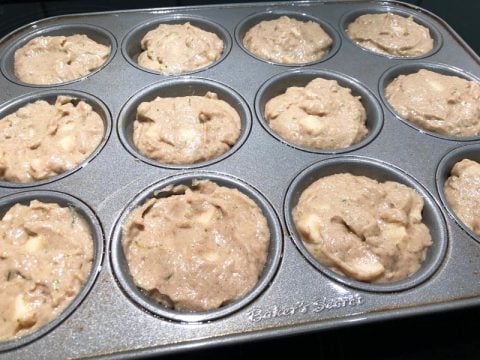 Gluten Free Apple Zucchini Muffin Batter in Muffin Pan